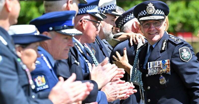 Former NT top cop's retirement march after 40 years of service