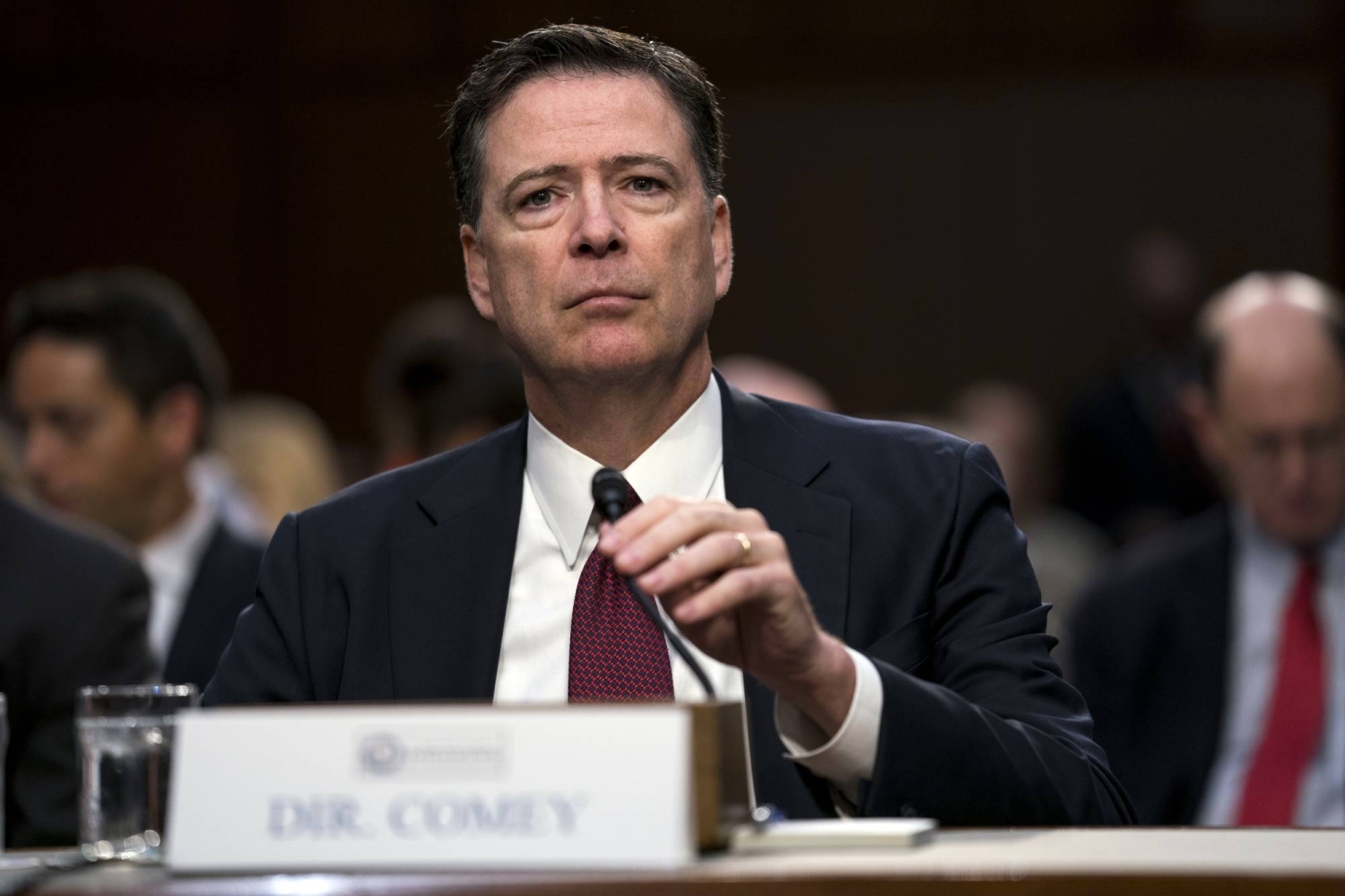 FBI agent relieved of duty over refusing Comey perp walk, four people familiar say