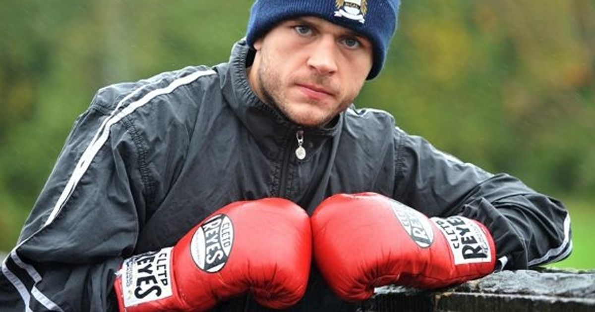 Former British boxing champion attacks woman as kids scream 'get off my mum'