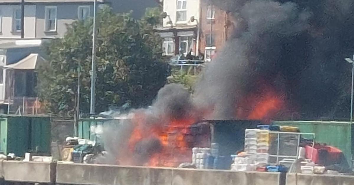 Thick black smoke seen across town as fire breaks out at fishing dock