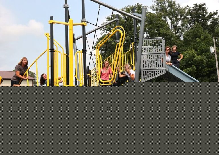 Hardin Northern teachers test out new playground before students arrive
