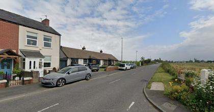 Driver taken to hospital after council vehicle crashes into bungalow