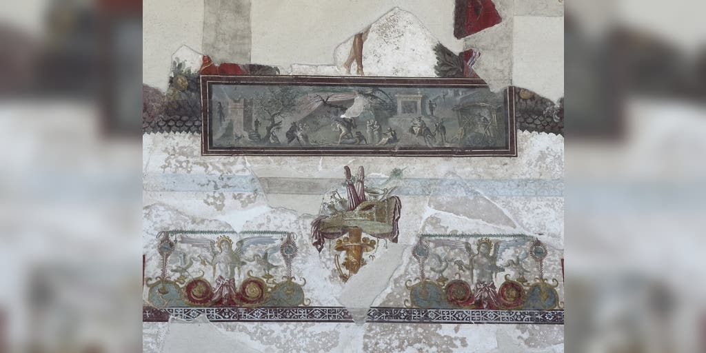 Archeologists restore large fresco on the ceiling of a home in Pompeii from 2,000 years ago