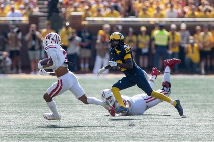 Rod Moore welcomed back to Michigan Stadium with interception against Wisconsin