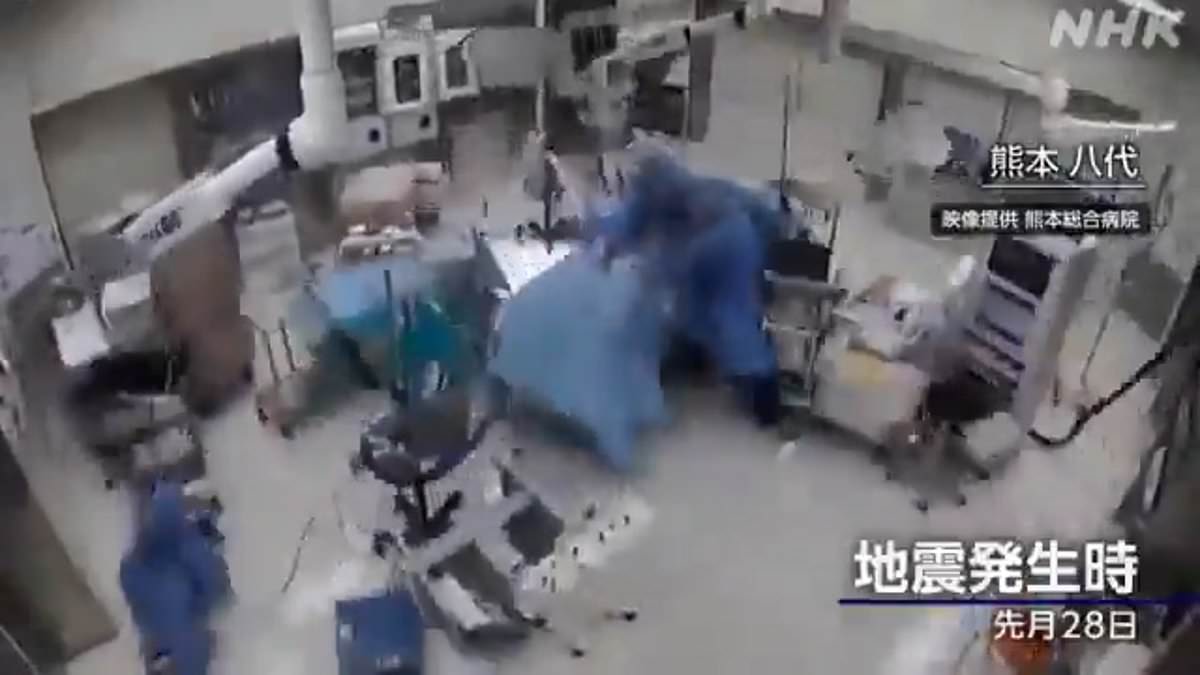 Moment Japanese surgeons cling to patient in operating theatre as 7.1 magnitude earthquake hits