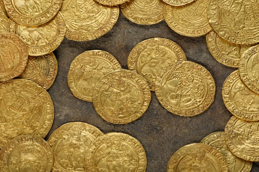 Couple Digging In Their Backyard Pulls 70 Gold Coins From The Mud