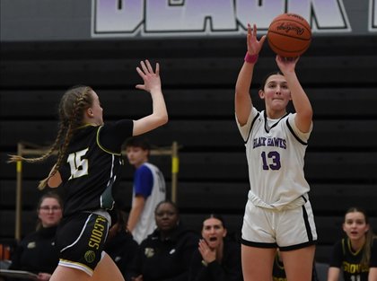 Photos of Birmingham Groves vs. Bloomfield Hills in OAA White girls hoops action