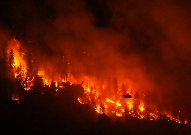 Climate change created conditions for Canada fires, scientists say, as Trump blames mismanagement