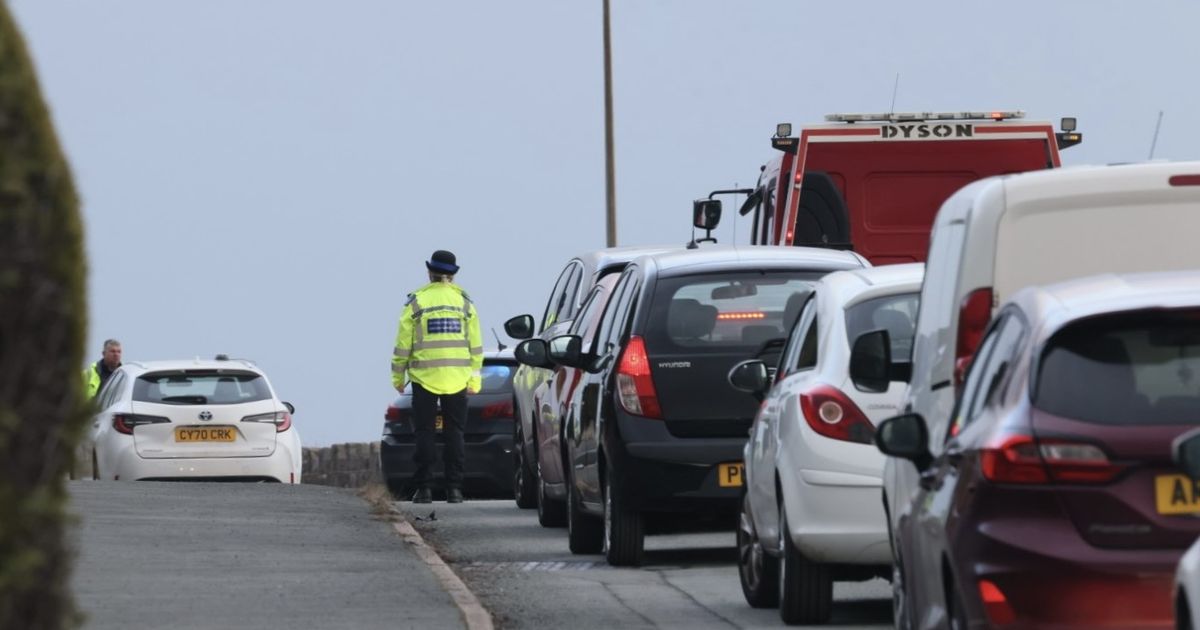 Trapped man freed after car crashes and ends up in ditch