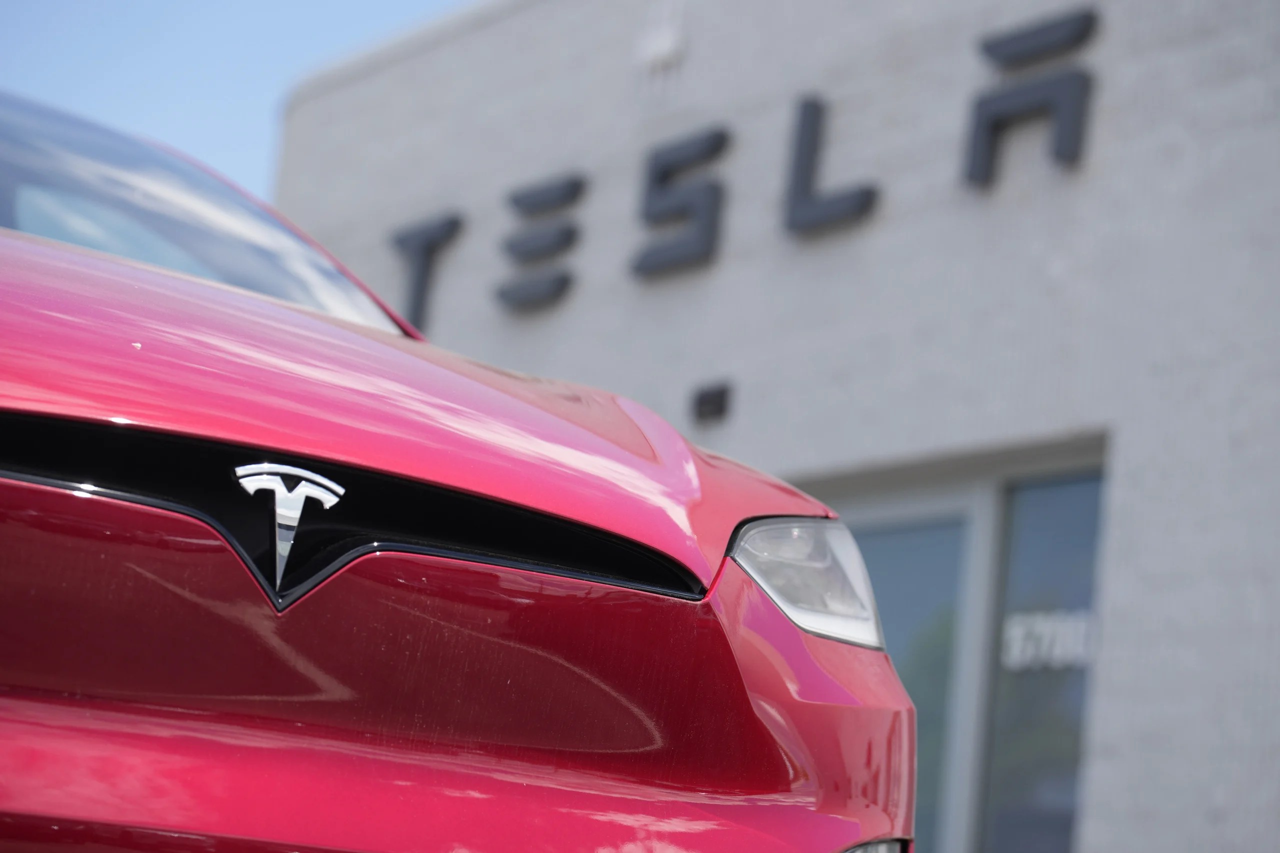 Tesla profits slumped 46% last year, as it lost its crown as the top EV seller
