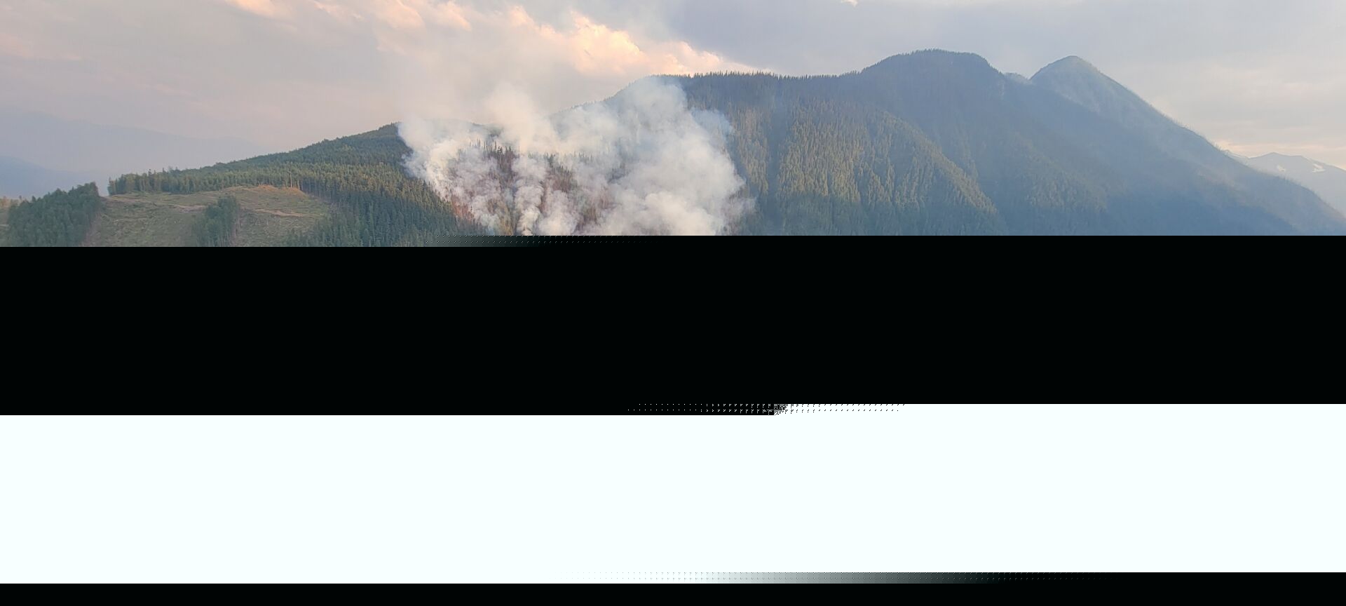 Evacuation alert lifted for Poplar Creek wildfire area
