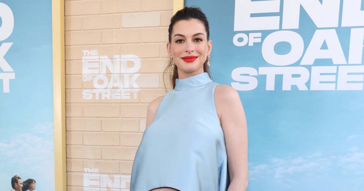 Anne Hathaway Slams Claims Her Pregnant Belly Is Fake After Crop Top Look