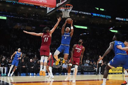 Paolo Banchero and Anthony Black lead Magic past Heat 133-124 to snap 4-game skid