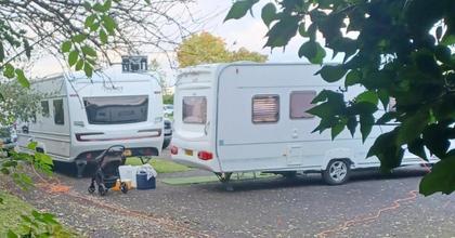 Traveller caravans set up camp on business park in Cheshire