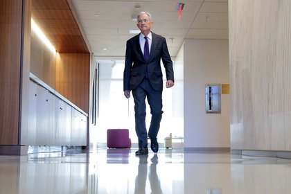 Powell hints at extended pause on rate cuts but stays mum on Trump attacks