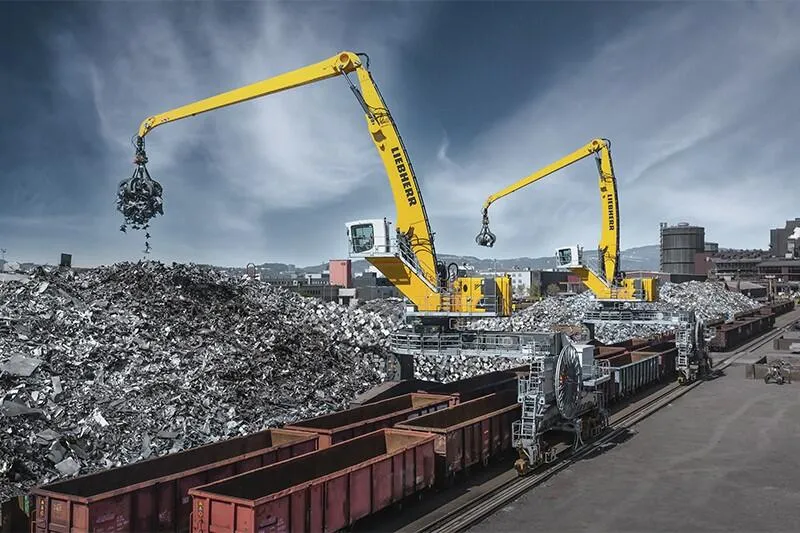 Handlers to feed arc furnaces