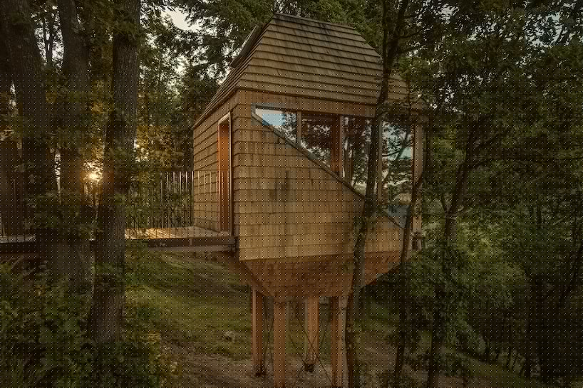 officina82 reimagines traditional italian hay barn as timber treetop retreat in ligurian alps