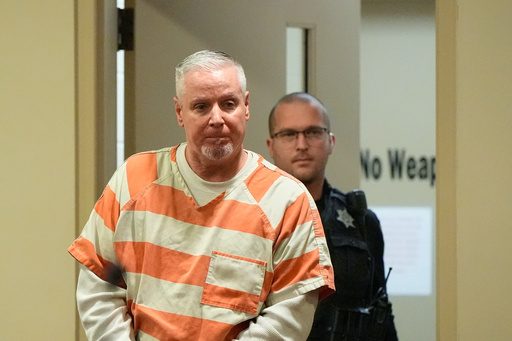 Father who gave his son the gun used in a Georgia high school shooting to be sentenced
