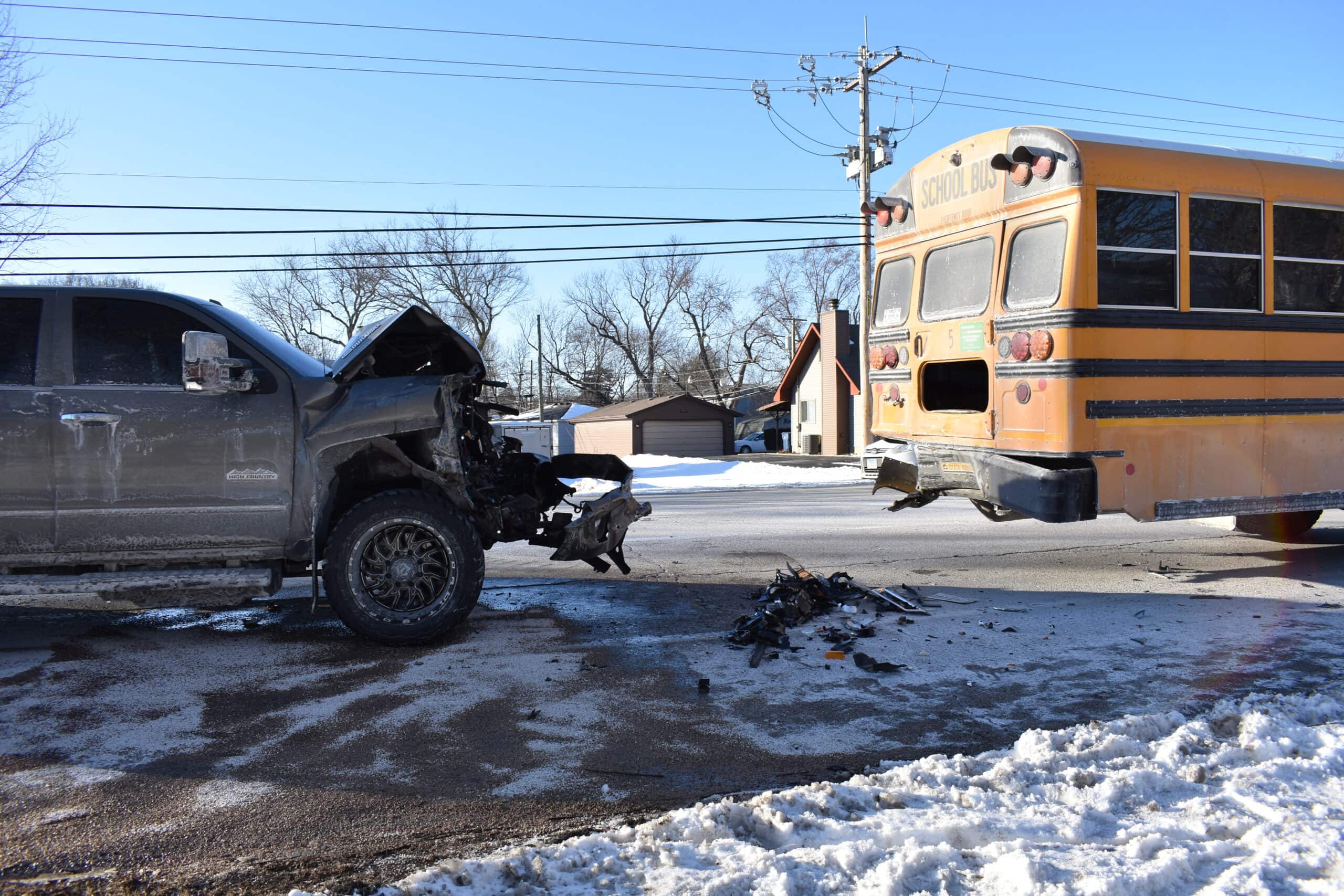 Pickup truck driver hospitalized after rear-ending school bus on Route 59 in Fox Lake Hills