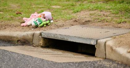 Mother charged after dead baby found in storm drain