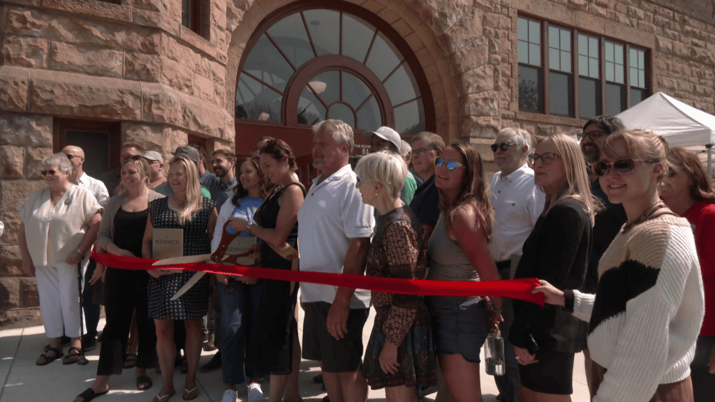 Historic Sandstone School officially reopens as apartment complex