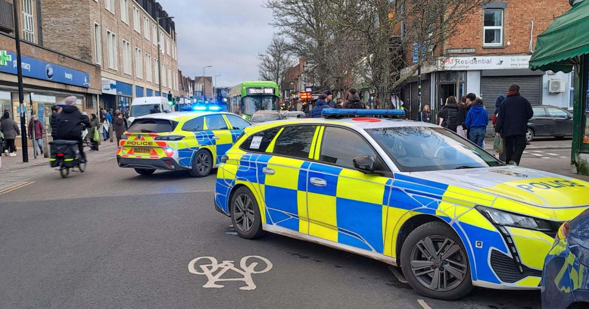 Police statement urges public to avoid city road as force 'engage' with man