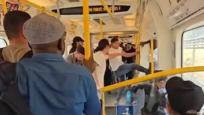 Police may charge Tube passengers after they tackled naked man who dropped his trousers in front of children