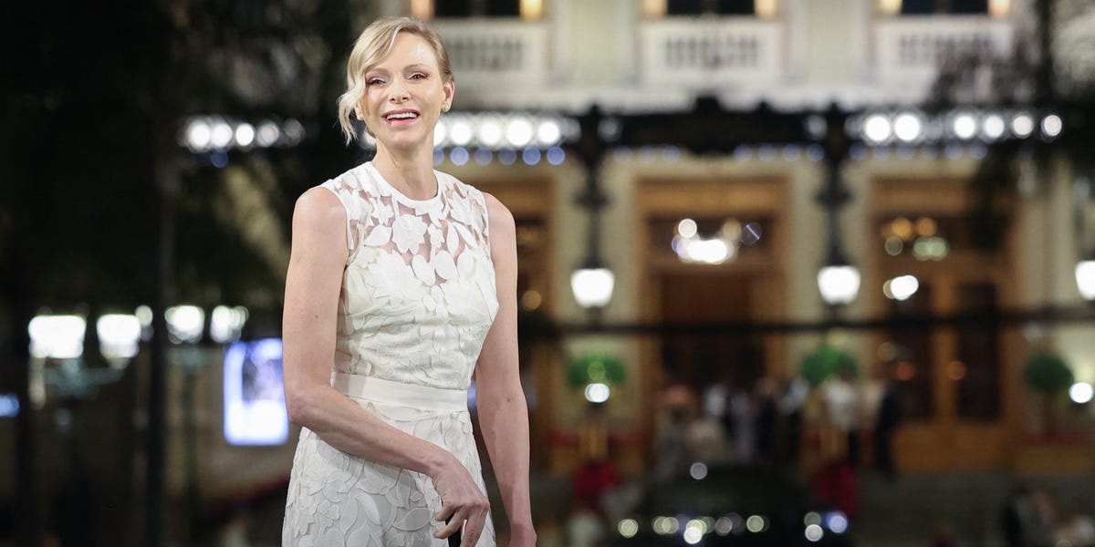 Princess Charlene of Monaco Shows Off Her Golf Swing in White Lace Dress