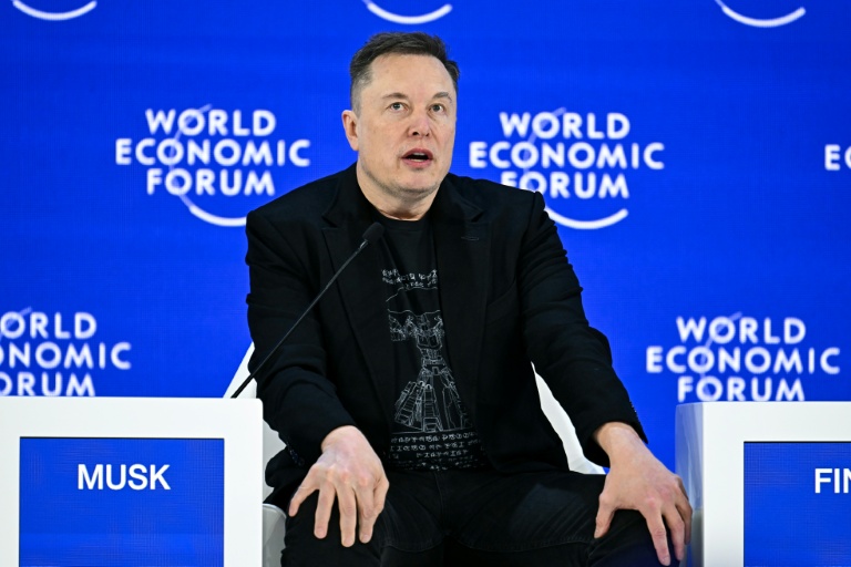 Tesla profits tumble on lower EV sales, AI spending surge