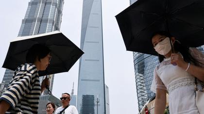 China lifts exit ban on Wells Fargo banker
