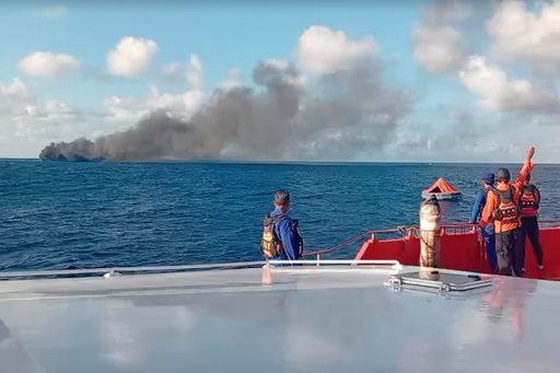 Crews work to rescue more passengers from burning ferry near Bali, Indonesia