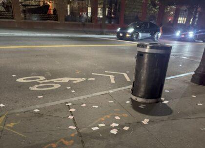 Nosy Neighbor: Why are there playing cards scattered on the street?