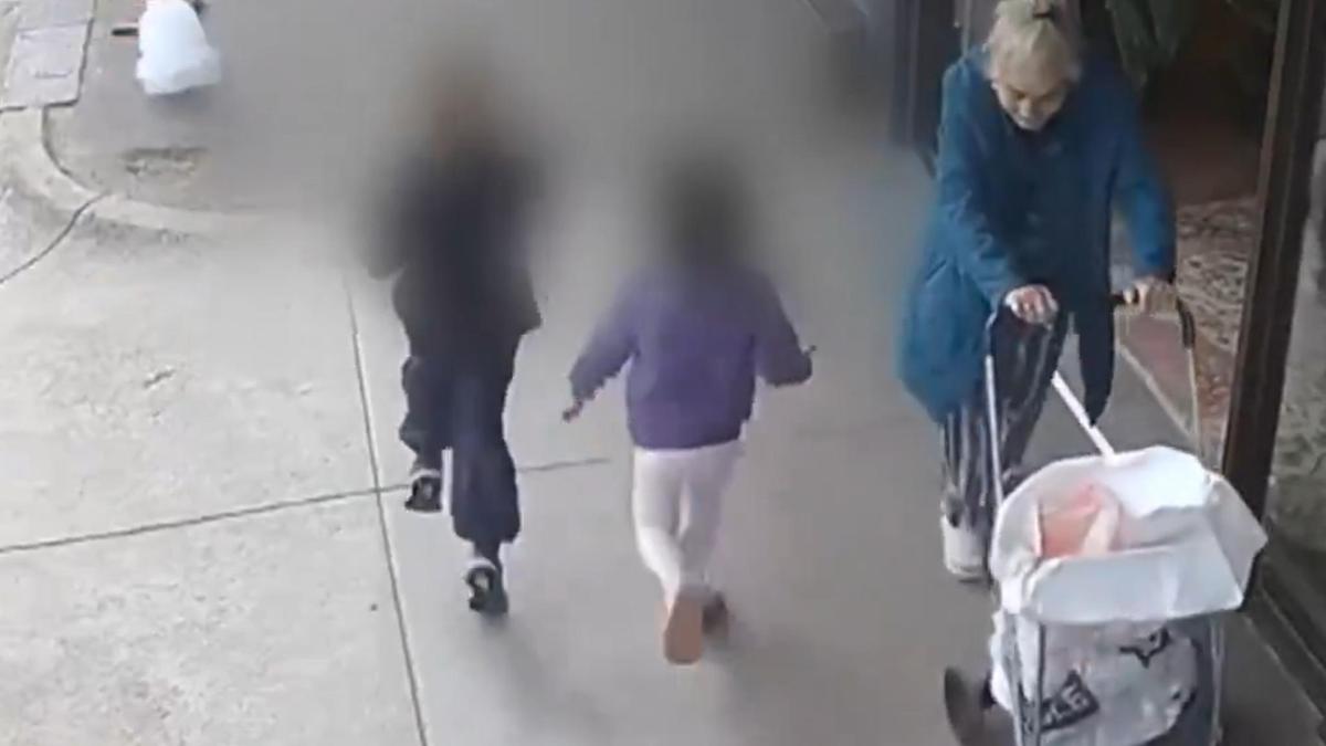 CCTV captures wild moment two children escape from Melbourne kindergarten, skip merrily down busy road in Fitzroy North