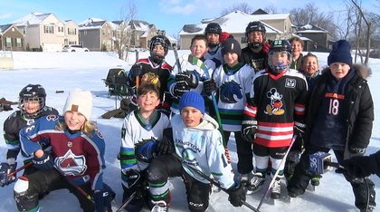 Snow day fun brings kids and parents together for pond hockey in East Hamburg