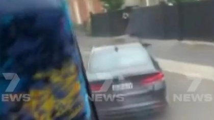 Gunfire erupts after car hits school bus