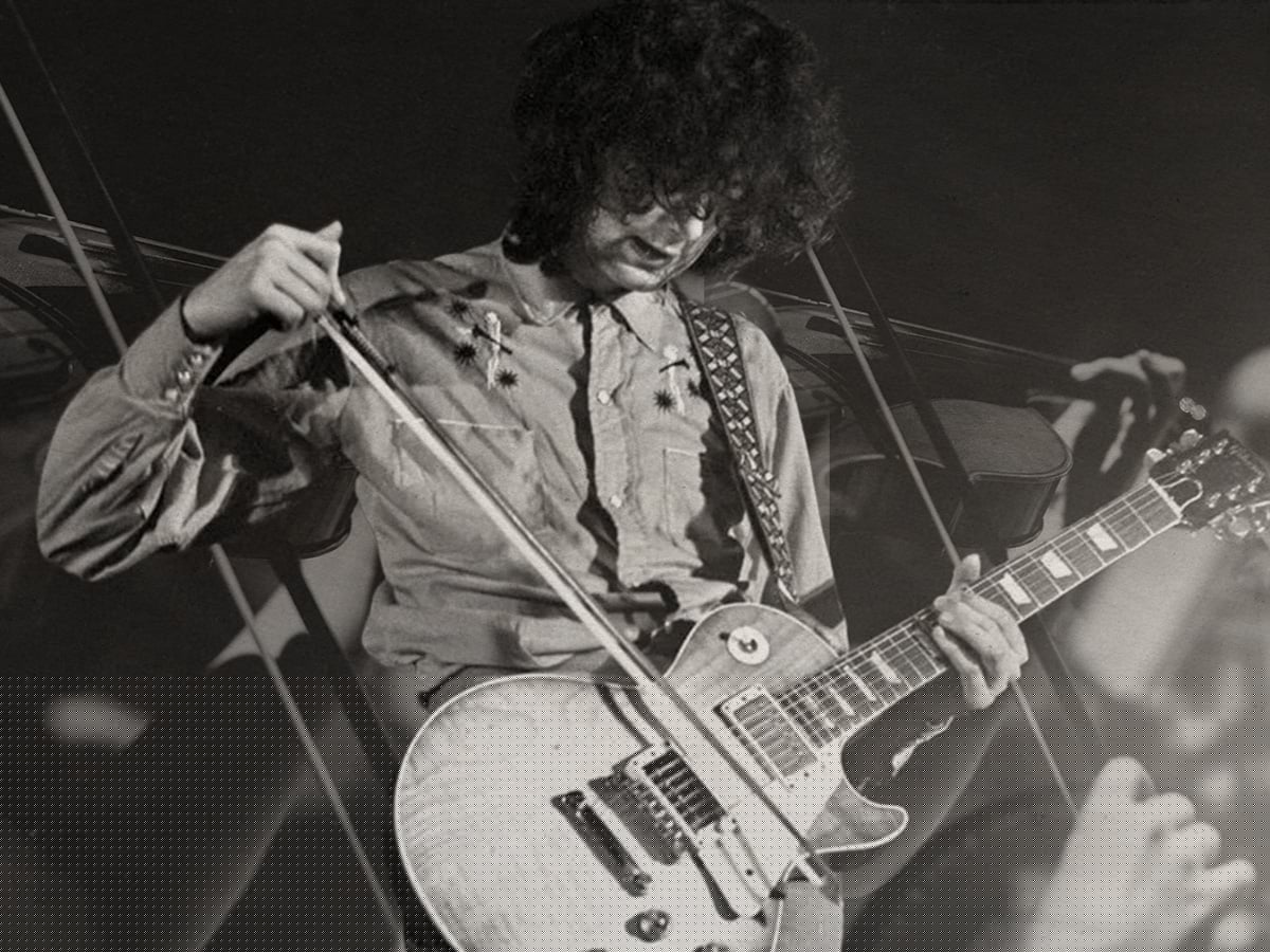 Who was the first musician to play guitar with a violin bow?