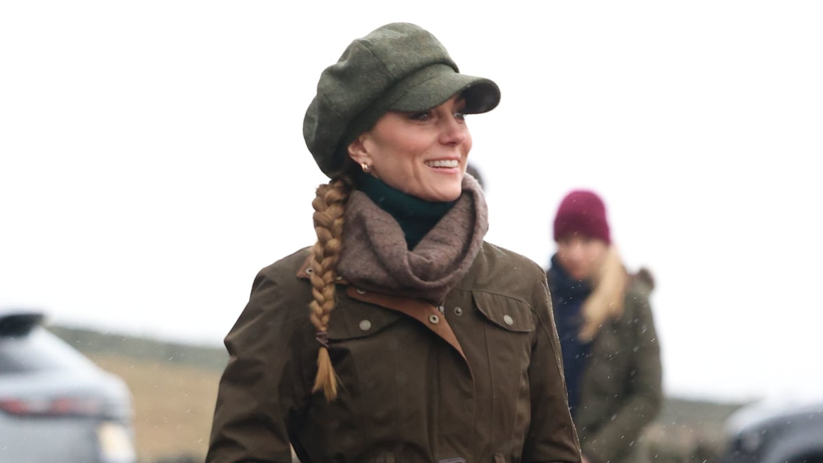 'Undaunted' Princess Kate shrugs off stormy weather as she motivates hikers