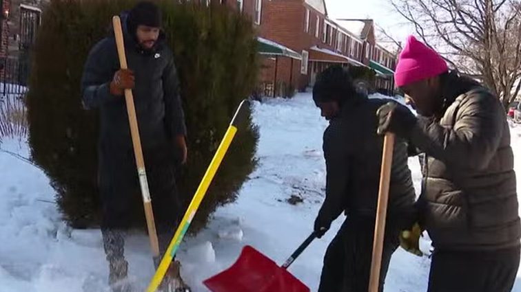 City residents answer mayor’s call, help rid sidewalks of snow and ice for free