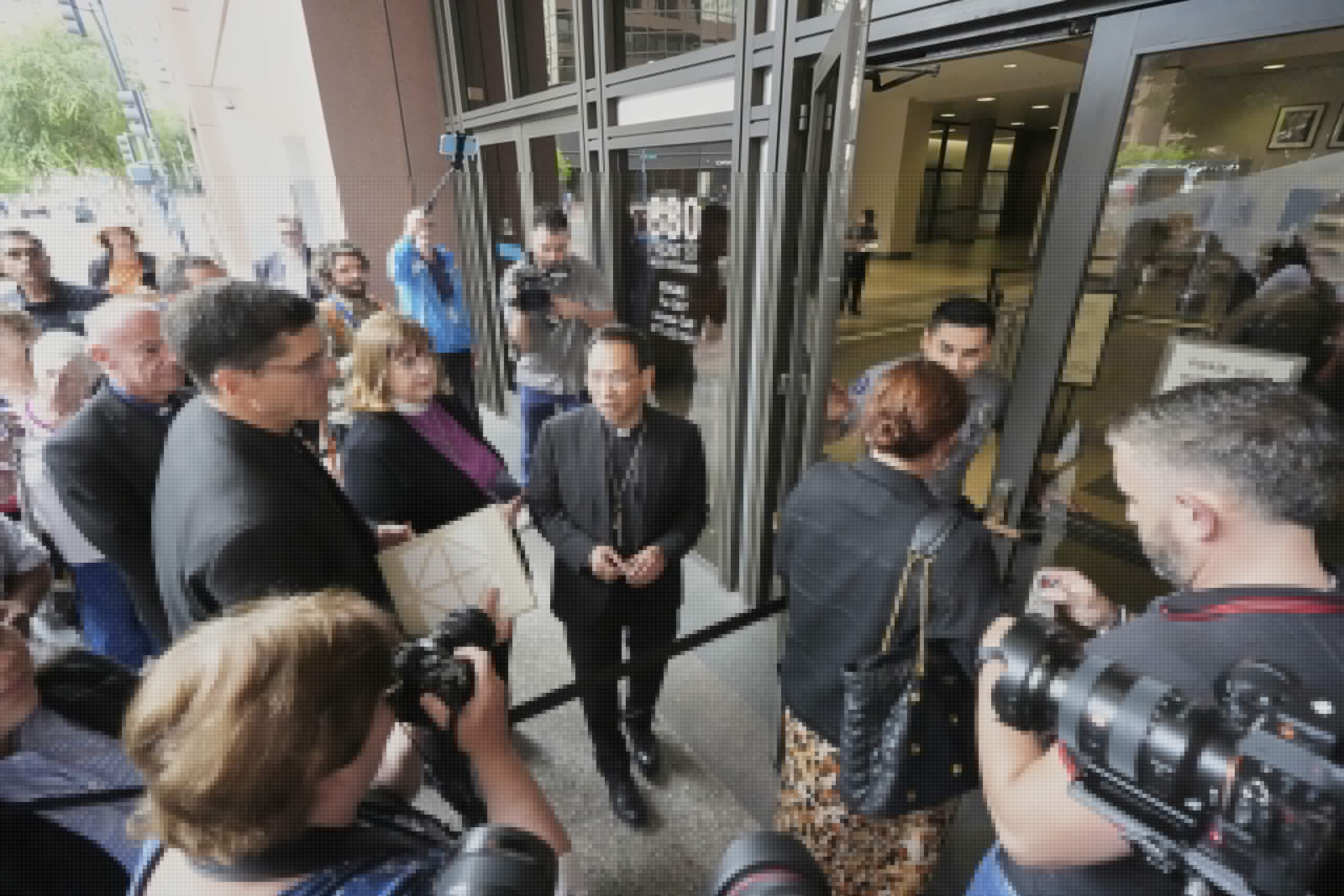 San Diego clergy visit federal immigration court to bear witness during crackdown on migrants