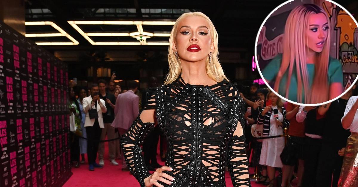 Christina Aguilera Channels 'Dirrty' Era in Racy T-Shirt and Fishnet Outfit