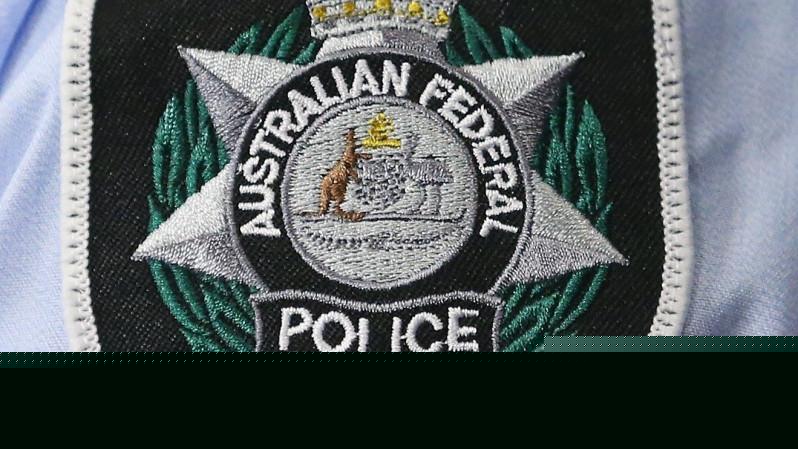 Federal police arrest man at Perth Airport after allegedly discovering child abuse material on phone