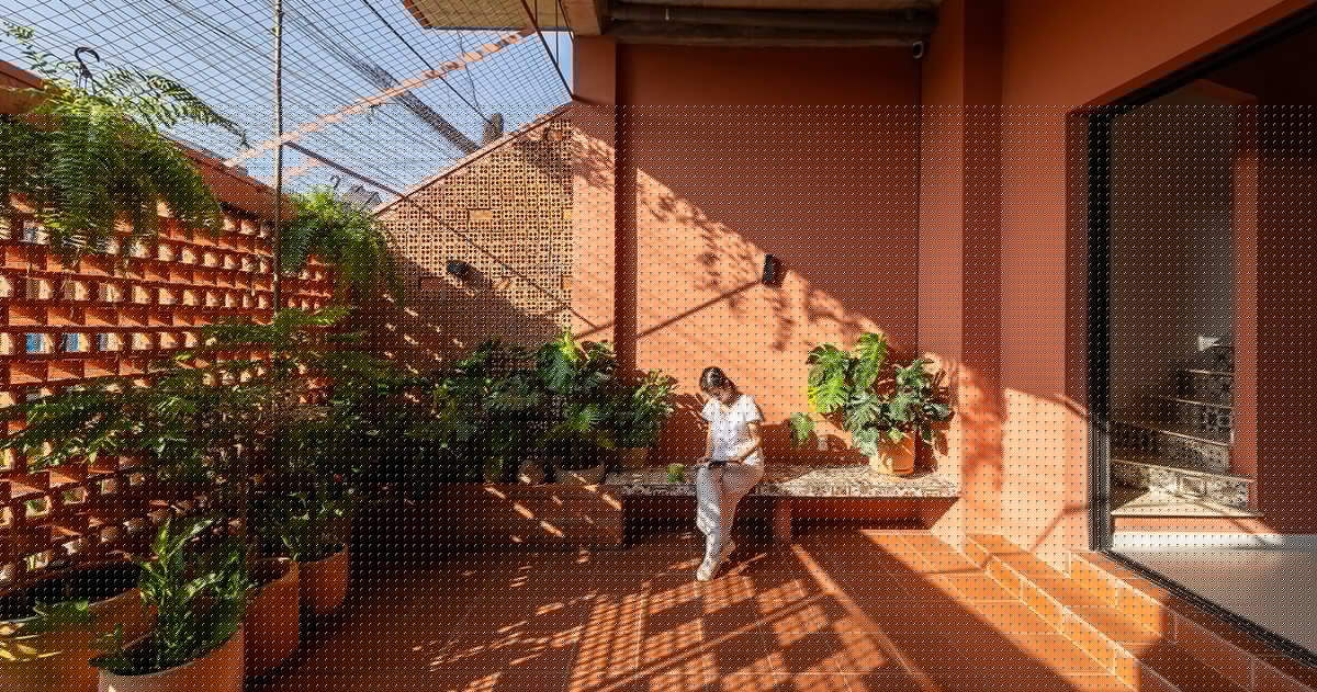 perforated terracotta screens cool NAQ architecture’s breezy vĩnh long house