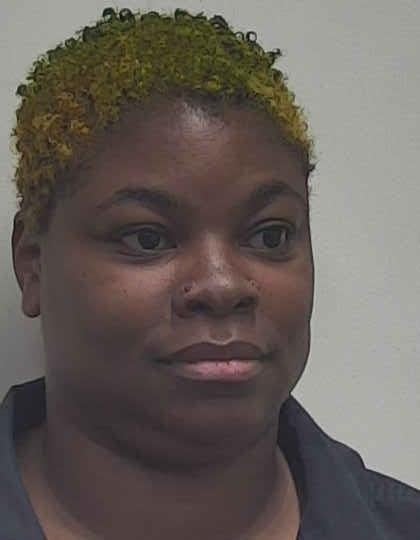 Woman arrested in Dalraida Road shooting