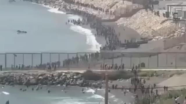 Thousands of migrants rushing into the Spanish city of Ceuta aided by the leftist gov