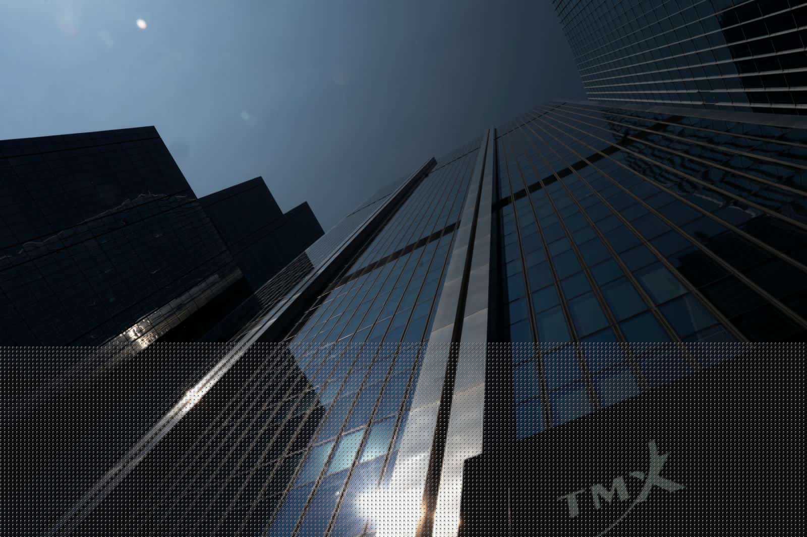 S&P/TSX composite index up in late-morning trading Tuesday, U.S. markets down