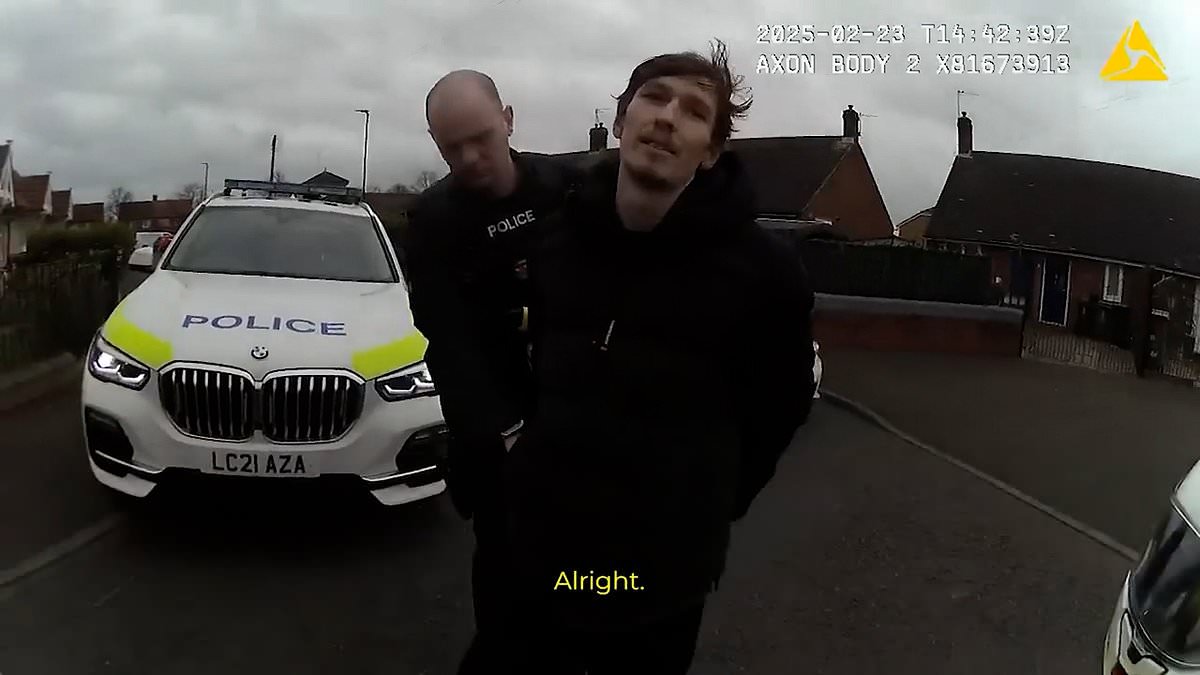 Moment motorcyclist leads police on 130mph chase through red lights and on wrong side of the road... and records it on his own camera