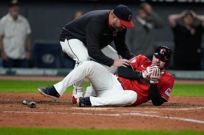 Guardians’ David Fry carted off field after being hit in face by pitch while trying to bunt