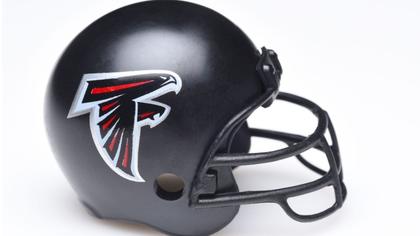 Atlanta Falcons’ right tackle Kaleb McGary carted off field during practice with left leg injury