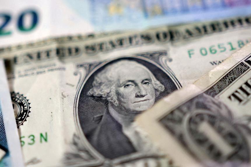 Dollar falls as traders assess US government shutdown, poor jobs data