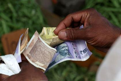 Rupee hits record low as U.S. tariff, visa policies heap pressure